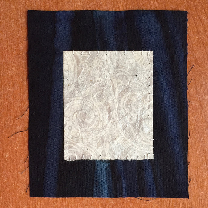 Hand Stitching Paper On Fabric
